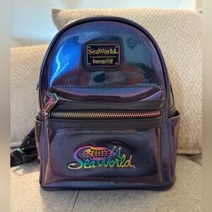 Loungefly SeaWorld Iridescent Purple Backpack